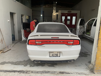 Red Wheels Garage - By owner
